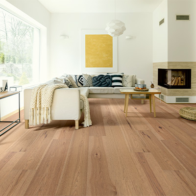warm toned hardwood flooring in cozy living room